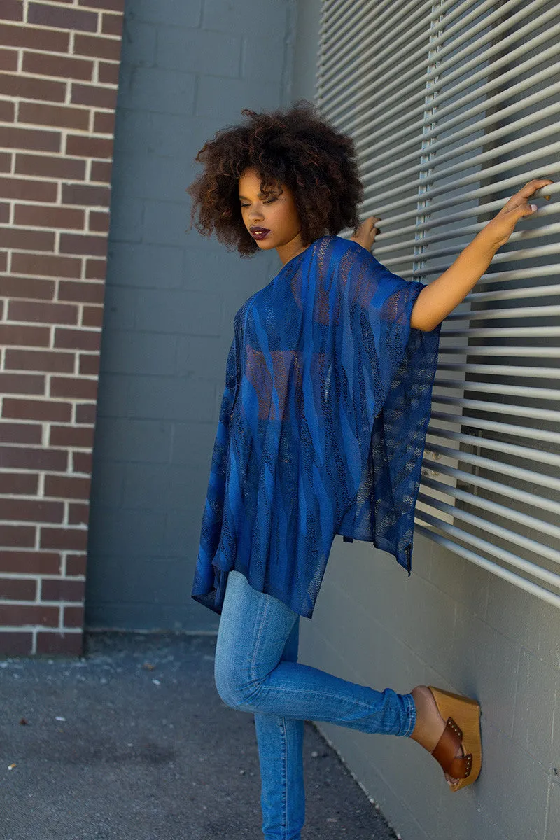 IAMISIGO: Needle Poncho